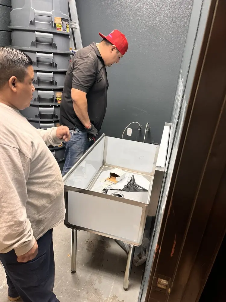 Commercial plumbing and sink installation in Asbury
